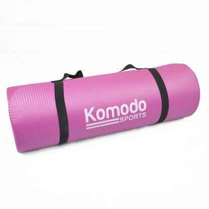 A pink Komodo Sport 15mm Yoga Gym Mat