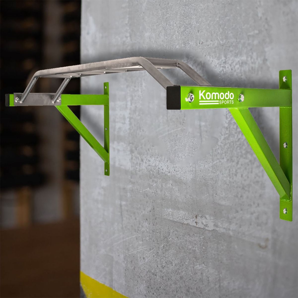 a green Komodo Sport Wall Mounted Pull Up Bar