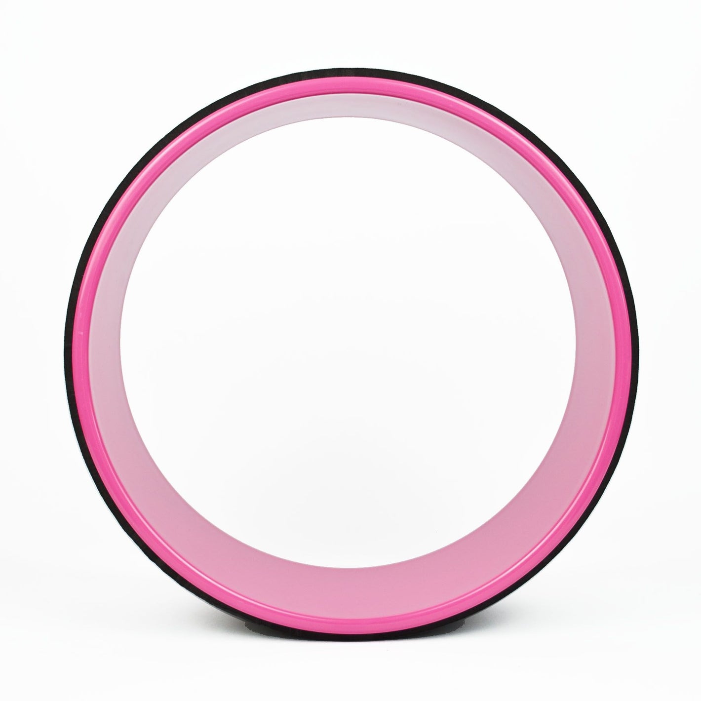 A pink Komodo Sports Yoga Wheel